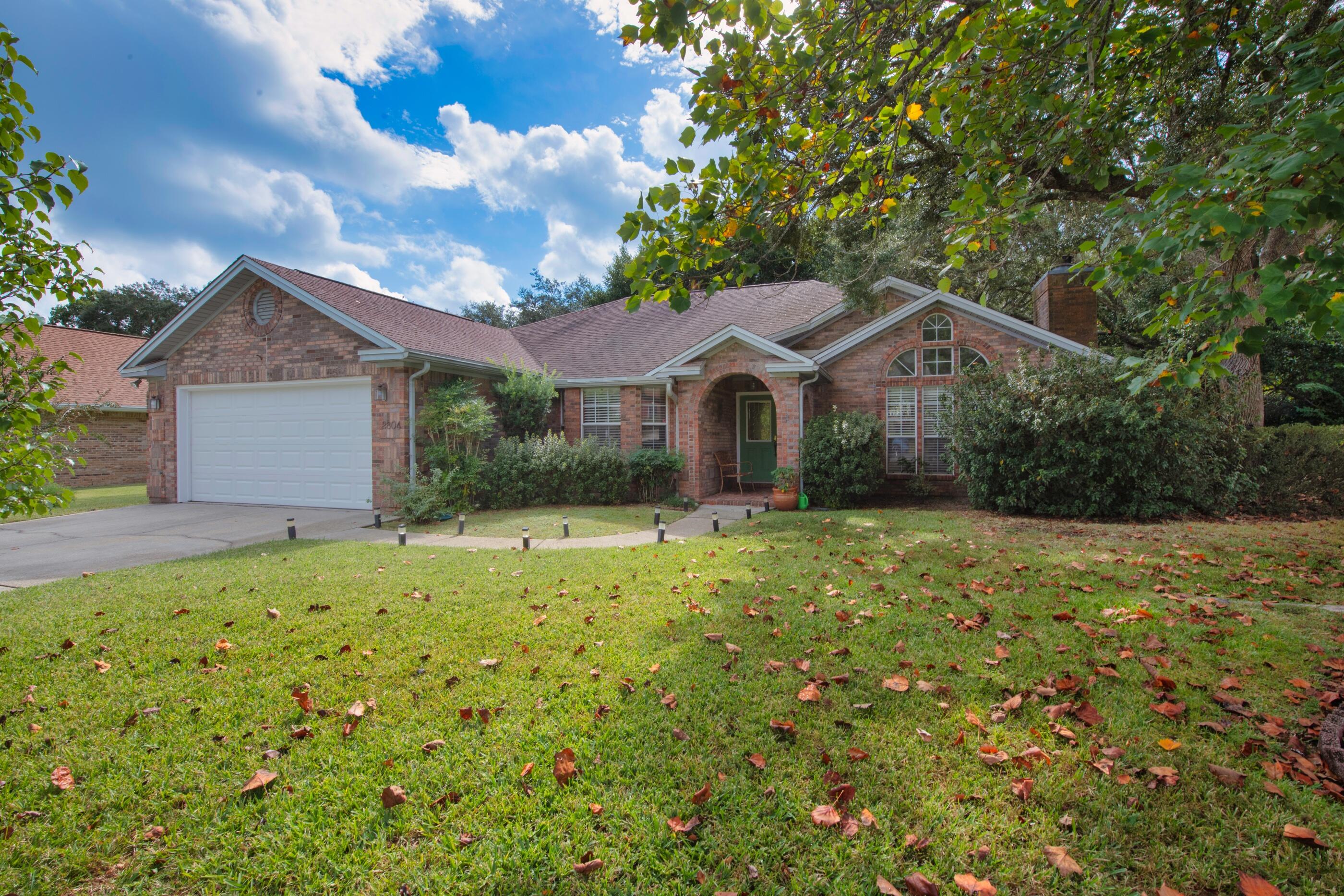Escape to Shalimar in this 3 bed/2 bath home on a Cul-de-sac! This concept includes a two car garage, living area with vaulted ceilings, sunroom accessing a screened-in porch, a master suite with a large walk-in closet, and a master bath with double vanities, separate shower, and a garden tub. The kitchen offers granite countertops, island, and ample cabinet and pantry space. Other features include fresh paint throughout, a tankless gas water heater, gas stove, gas fireplace, and security system. This neighborhood in the Lake Lorraine area has underground utilities, no HOA, and immediate proximity to Meigs Park Boat Ramp and Shalimar Pointe Golf Club. Eglin AFB is less than 5 miles away, Hurlburt Field 12 miles away, and Destin beaches and entertainment less than 15 miles away.