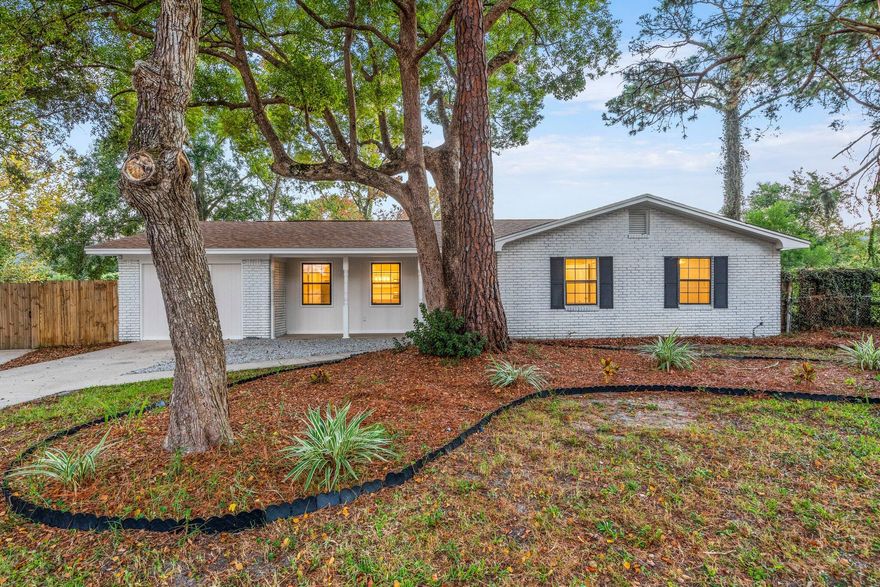 **BEAUTIFULLY RENOVATED*** Spacious 4 bedroom 2.5 bath house on a large CORNER LOT. Open concept living room and kitchen is perfect for entertaining. The kitchen boasts QUARTZ Countertops, SUBWAY tile backsplash, stainless steel appliances- including a GAS RANGE + large island that doubles as storage and seating. NO CARPET and a SPLIT FLOOR PLAN. There is a MASTER WING with a stunning TILE SHOWER,  DOUBLE vanities and WALK IN closet. The guest bath has two vanity areas with a shared shower space. Perfect for busy mornings. MASSIVE YARD fully fenced with a privacy fence. ! It is .3 miles from Ferry Park in Fort Walton Beach - where one can frisbee golf, play tennis, basketball, and enjoy natural trails. Close to the white sand beaches of the Emerald Coast. Call your favorite agent today!