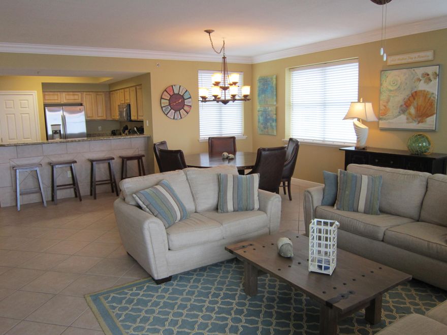 On top of the World! You can see all the way to the Destin Harbor from this sensational 3 bedroom 3 bath unit in Ariel Dunes II - The gulf and bay views will amaze! This beautifully furnished unit is NON-RENTAL and has all tile floors, 9 foot ceilings, granite tops, custom drapes and shutters - The master suite is spacious with a large closet, dbl vanity, separate tub and shower - Bedroom 3 has a separate balcony overlooking the golf course and bay - This gated property has two gigantic pools and, as a part of the Seascape Resort with golf and tennis, shares 2000 feet of deeded beach - A must see!