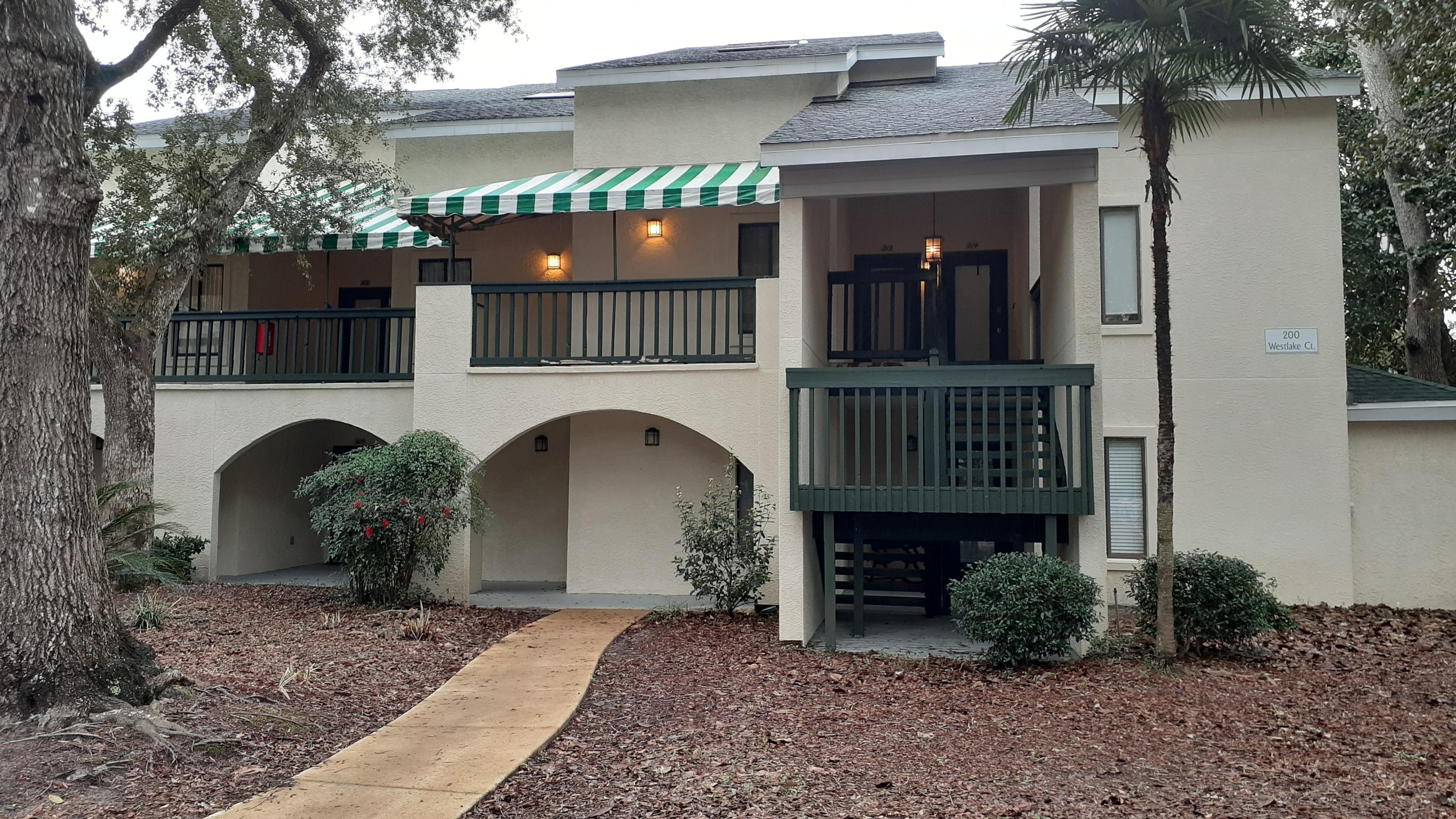 WONDERFUL UPSTAIRS UNIT OVERLOOKING THE LAKE OUT BACK. TWO DECKS OFF THE FAMILY ROOM AND UPSTAIRS MASTER BEDROOM. ONE BEDROOM AND BATH ON MAIN LEVEL, MASTER AND BATH UP WITH A LOFT AREA FOR OFFICE OR ADDITIONAL SLEEPING QUARTERS, ALSO LARGE WALK IN ATTIC FOR STORAGE. SHOWERS IN BOTH BATHS HAVE BEEN UPDATED.ALL APPLIANCES REMAIN, GREAT LOCATION IN BLUEWATER WITH ACESS TO POOL, TENNIS CENTER AND GOLF CLUB WITH SPORTS BAR AND RESTAURANT.