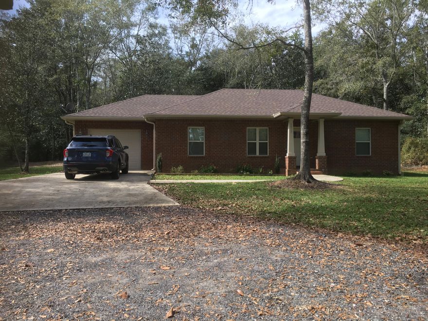 CUSTOM BUILT 2019. One owner home is in IMMACULATE move-in ready condition! This 3 bedroom, 2 bath home has a combination of convenience & comfort. Split floor plan. 1161 square feet of living space and a one car garage. Carpet in the main living area & bedrooms. LVP in wet areas. Stepping out back you can enjoy the serenity of the covered patio looking out into your private backyard. Large 20x30 pole barn for storage of outside equipment. Parking is ample with a one car garage and a semi-circle driveway. Mature shade trees in the back yard. Private 1.74 acre property. Compared to others on the market, this one will rise to the top. Pride of ownership is evident throughout this home. Buyer to verify data, dimensions, & all info deemed important. Schedule your showing toda