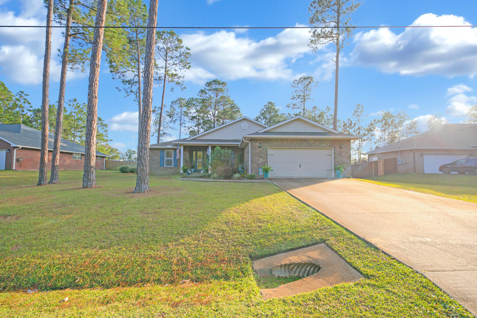 Welcome Home!! This BEAUTIFUL CRAFTSMAN style home is located in Holley by the Sea. This amazing home has 3C granite countertops, stainless steel appliances, pantry and soft close drawers in the kitchen. Upon entering into the spacious area of the master bedroom you will be drawn to the coffered ceiling as well as the convenience of the en suite bath. The master bath includes double vanity, garden tub, separate shower and a walk-in closet. This home also includes a Florida room with lots of natural lighting throughout to enjoy those beautiful sunny days. Ownership includes membership to Holley by the Sea's multi-million-dollar 45 acre recreation center, tennis courts, swimming pools, full gym, aerobics, summer camp, basketball court and access to boat launch.