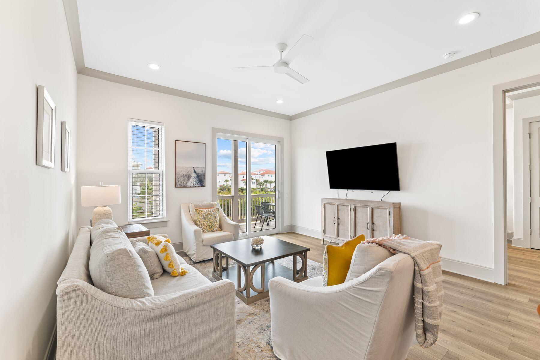 This fully furnished second-floor unit is at the west end of sought-after 30A and within walking distance of the beach. Contemporary interiors showcase lofty 10-ft. ceilings and Mohawk LVP flooring throughout. The open living space has large windows and full-height sliding glass doors delivering an abundance of natural light.  The sleek white kitchen is a chef's delight with Shaker-style cabinets, quartz counters, subway tile backsplash and newer stainless steel appliances. A generous island provides seating for four hungry diners and houses a stainless steel sink and dishwasher. A separate dining area merges into the generous sitting room where you can put your feet up in front of the TV. Outside, the full-length balcony delivers superb views of the pond and fountain with peek-through glimpses of the emerald Gulf of Mexico. It's a tranquil outdoor space for dining, reading and relaxing after a fun-filled day. Three generously sized bedrooms include a bunk room with four custom built-in bunks. The master bedroom has the advantage of a private bathroom with a walk-in shower and direct access to the balcony. Ideal as an investment property, this family-friendly retreat is a short stroll from two beach access points. Load up the beach wagon with your cooler and lounge chairs and spend the day on the beautiful white sandy beach. Built in 2020, it is one of just 19 units in this select development, which boasts a resort-style heated pool and separate hot tub for year-round enjoyment. This well-located condo is within easy reach of hiking and recreational activities at Topsail Hill Preserve and Point Washington State Forest. Nearby Gulf Place, Grayton Beach and Seaside, Florida, offer limitless dining and shopping along with a calendar of events to keep everyone happily entertained.