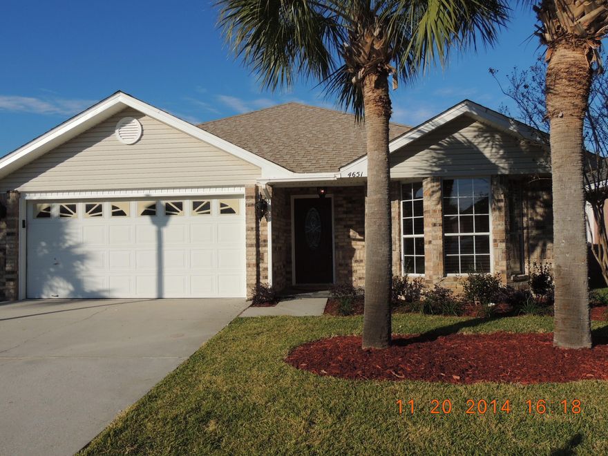 Beautifully updated home! Gorgeous kitchen with all new cabinets, granite counter tops and modern glass tile backsplash. All new high end Electrolux appliances. Baths have granite countertops. Living room has hard wood floors and bedrooms have new wall to wall carpet. Other living areas have very nice tile. Fireplace is woodburning but could be converted to gas. There are fresh paint throughout the home. The yard is newly sodded and professionally landscaped with a sprinkler system and privacy fenced back yard. This home is a must see. Buyer to verify all pertnent information and dimensions.