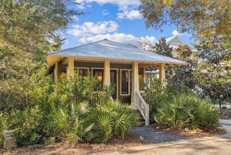 Charming Florida-style beach cottage in the heart of Blue Mountain Bch, just off 30A in Forest Lakes is awaiting you! This home is situated on a private street within minutes to pristine sugar white sandy beaches of the Gulf. Owners are MOTIVATED and are offering home FULLY furnished. Features include new appliances, a private lower level with a separate entry, upper and lower porches overlooking preserved state forest for ensured future privacy. Turn-key ready and in Real Joy's short-term rental program!Enjoy the gated entrance, large community pool, covered pavilion for entertaining, kids park and playground, walking paths, fully stocked fishing pond for catch and release, close proximity to state forest for miles of hiking, biking, and trails along the serene Longleaf trailhead