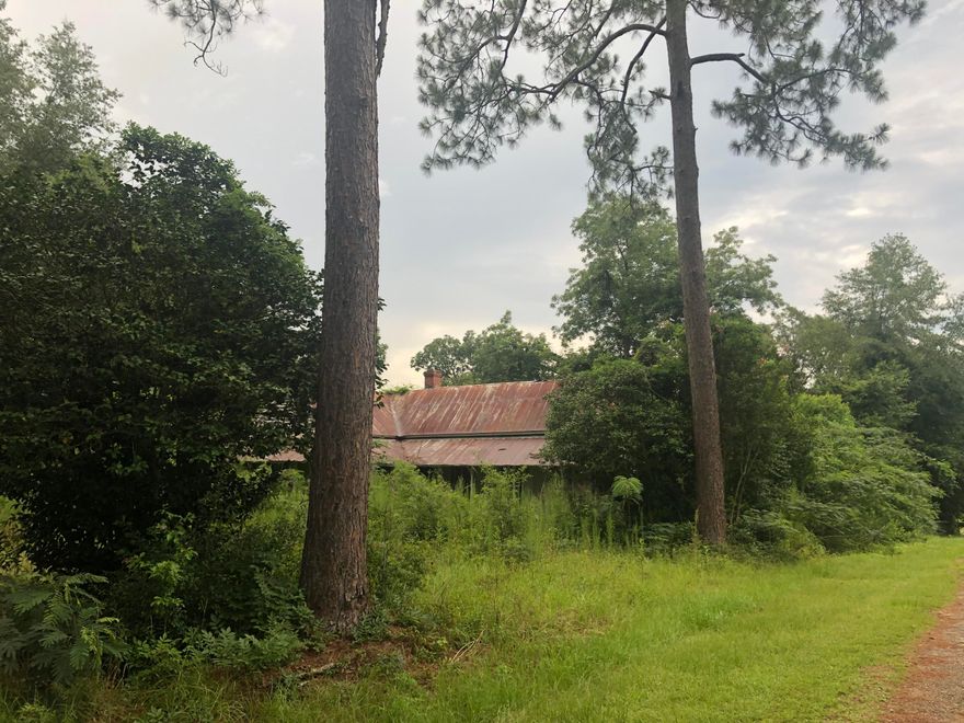 PRICE REDUCTION! Prime location in Laurel Hill. Investors look no further. Half acre, level lot located in the heart of Laurel Hill across from Laurel Hill Grill and Tom Thumb.