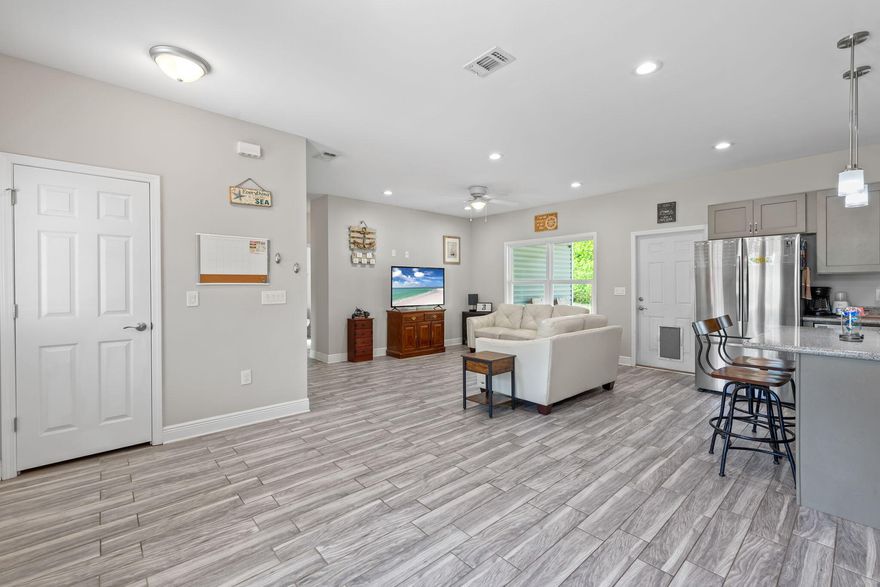 Come check out everything this house has to offer: large walk-in pantry, covered back and front porch, Master bathroom has double vanity, large walk-in closet, 2 additional bedrooms have plenty of closet space as well. Granite countertops throughout. Carpet is in the bedrooms only and hard wood style tile floors in main living areas and bathrooms. Hugh back yard so plenty a room to add a pool and outdoor kitchen in the future.