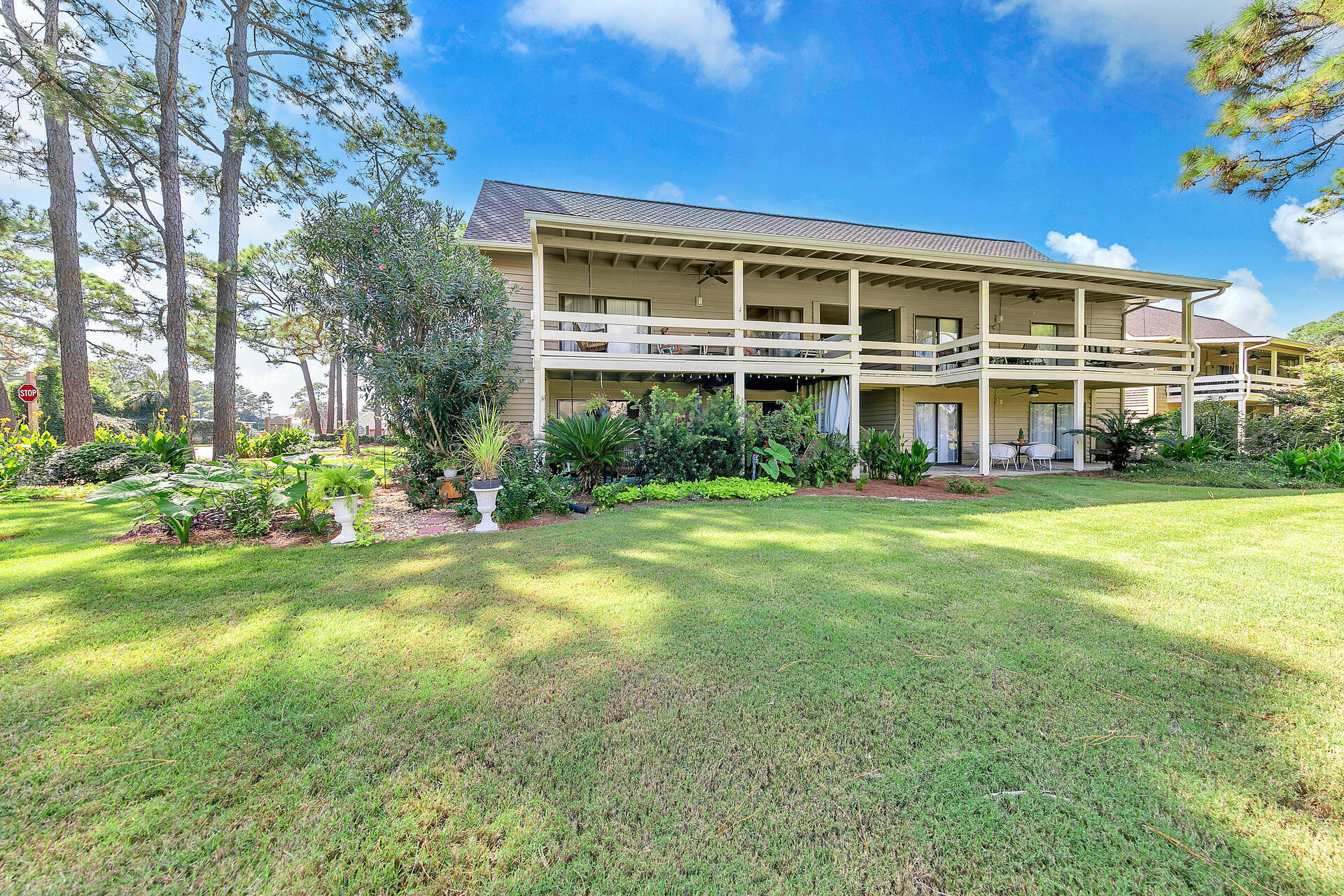 Lots of natural light streams into this cheerful beach retreat located in the timeless resort of Seascape.  A wonderful secluded covered patio grants a peaceful area to meditate, read, converse and relax in privacy.   Oversized neutral tile supplies continuity throughout the living areas and bedrooms.  Kitchen appliances include a new dishwasher and refrigerator and granite countertops are outlined by a complimentary backsplash.  Plenty of countertop space in the bathrooms makes getting ready for your day easy.  Meander just a short easy distance to enjoy the most beautiful white sand beaches and emerald water of the Gulf of Mexico.  Play tennis or golf onsite!  Swim in one of the several community pools.  Attend a concert! Seascape's unique offerings of a phlethora of activities makes this one of the best resorts in the panhandle!  New HVAC was installed in 2022.