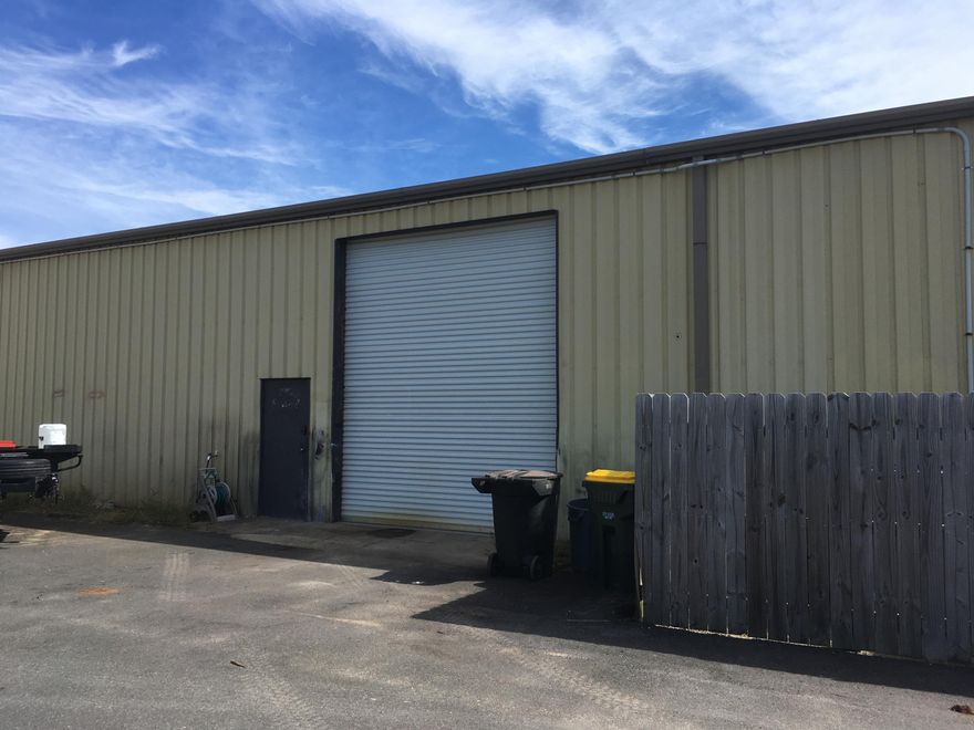 Warehouse with 12 foot wide overhead door. The warehouse is 25 feet wide and 60 feet deep.