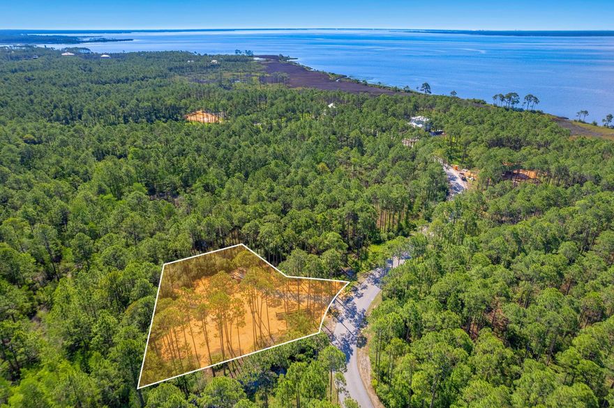 Discover a premium .55-acre lot, with a professional survey, perfect for building your dream home. This exceptional homesite offers plenty of space and flexibility to bring your vision to life. Nestled in a community that celebrates nature and outdoor living, RiverCamps is ideal for water enthusiasts. Enjoy a lifestyle rich in boating, fishing, paddleboarding, crabbing, and hiking on our scenic 7-mile nature trail system. Plus, benefit from convenient onsite boat ramp access and boat storage. Your perfect escape awaits at RiverCamps on Crooked Creek!