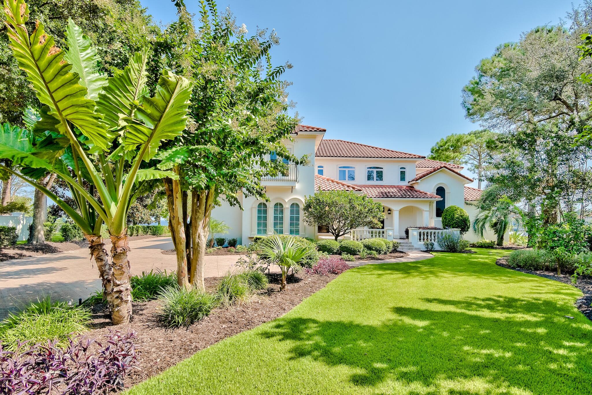 Breathtaking views surround you in this exquisite waterfront home at the mouth of Jones Bayou with expansive views of the Bay & Bayou and 186' of water frontage, the dock and boat lift are new with the addition of lighting, two 50 Amp electrical outlets and water. This lot is by far one of the best in Kelly Plantation!The home has been Completely  remodeled and upgraded from top to bottom with the addition of an additional bedroom, a full bath, second family room and a large pool with screened lanai that over looks the bayou and the bay. The Chef's kitchen and first floor family room have been opened to offer an expansive first floor with water views from every room. The master suite is located on the first floor with a large ensuite bathroom with dual vanities, new cabinets, leathered