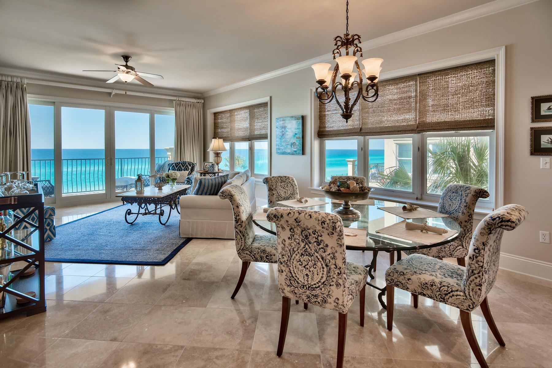 You can live in paradise in this luxury condo with views of the aquamarine waters of the Gulf of Mexico and white sand beach on two sides. Unusual not only for being an end unit with spectacular views and natural daylight flooding the living space, but also for having never been rented, this property raises the bar on family vacations and as an investment opportunity. A nicely organized kitchen sports high end, stainless steel appliances and granite counter tops. Diagonally-laid travertine flooring and creamy walls with crispy white trim create the perfect environment with a professionally decorated decor in soothing blue and cream fabrics.
