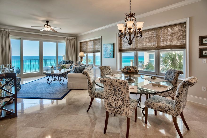 You can live in paradise in this luxury condo with views of the aquamarine waters of the Gulf of Mexico and white sand beach on two sides. Unusual not only for being an end unit with spectacular views and natural daylight flooding the living space, but also for having never been rented, this property raises the bar on family vacations and as an investment opportunity. A nicely organized kitchen sports high end, stainless steel appliances and granite counter tops. Diagonally-laid travertine flooring and creamy walls with crispy white trim create the perfect environment with a professionally decorated decor in soothing blue and cream fabrics.