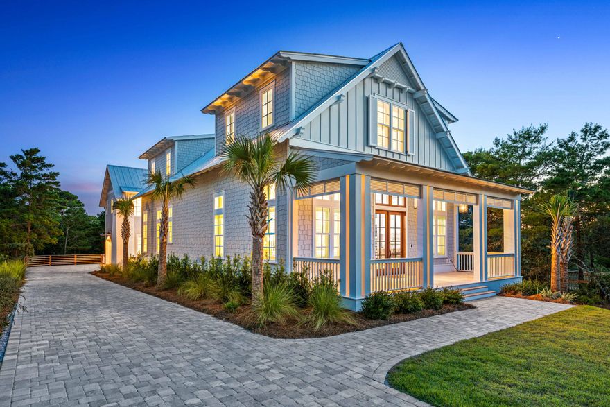 Welcome to 87 Sky High Dune Dr, a masterpiece of luxury living nestled in the heart of Blue Mountain Beach, FL. This newly constructed 5-bedroom, 5.5-bathroom estate spans 3,586 square feet and is the epitome of coastal elegance. Custom-built in 2024 by the renowned Borges Brooks Builders and exquisitely designed by Katie Grace Designs, every detail in this home exudes sophistication and charm.As you step inside, you're greeted by stunning herringbone-patterned wood floors and beautiful custom tile and woodwork throughout. The open-concept living space is bathed in natural light, highlighting the gorgeous chandeliers, sconces, and high-end cabinetry throughout this home. The gourmet kitchen is a culinary masterpiece, featuring top-of-the-line appliances, custom cabinetry... and exquisite finishes.

Outside, enjoy the serene ambiance of your private oasis with a heated pool, spa, gas fireplace and a summer kitchen, all situated on a generous .33-acre lot. 

The front porch is adorned with charming gas lanterns, adding a touch of timeless elegance. The property also features separate living quarters in the carriage house, providing an ideal space for guests or extended family.

For your convenience, the home includes a 2-car garage, ample parking, and a laundry room with double sets of washers and dryers. The loft area, with its custom built-in beds, provides extra space for relaxation or hosting guests. In the master suite, unwind in the luxurious bathroom, featuring a private sauna and steam shower for the ultimate spa-like experience.

Located just a 2-3 minute golf cart ride from the beach, you'll have easy access to the pristine shores of Blue Mountain Beach and popular local spots like Blue Mountain Beach Creamery, Cowgirl Kitchen, and Redfish Taco within walking distance. 

This home is not just a place to live but a lifestyle to experience. Welcome to your dream coastal retreat at 87 Sky High Dune Dr.