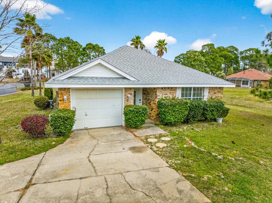 Located in the desirable Bayside neighborhood, this brick home features 3 bedrooms, 2 bathrooms, an updated kitchen, new flooring, and fresh paint, new living room TV, plus an attached garage. Enjoy community amenities including a pool, tennis courts, playground, picnic area, and fishing pier along beautiful Choctawhatchee Bay. Take in bay views from the covered back porch, dining room, living room, and bedrooms. A walking path leads to shopping and dining at Silver Sands Premium Outlets, offering the perfect blend of convenience and coastal living.
