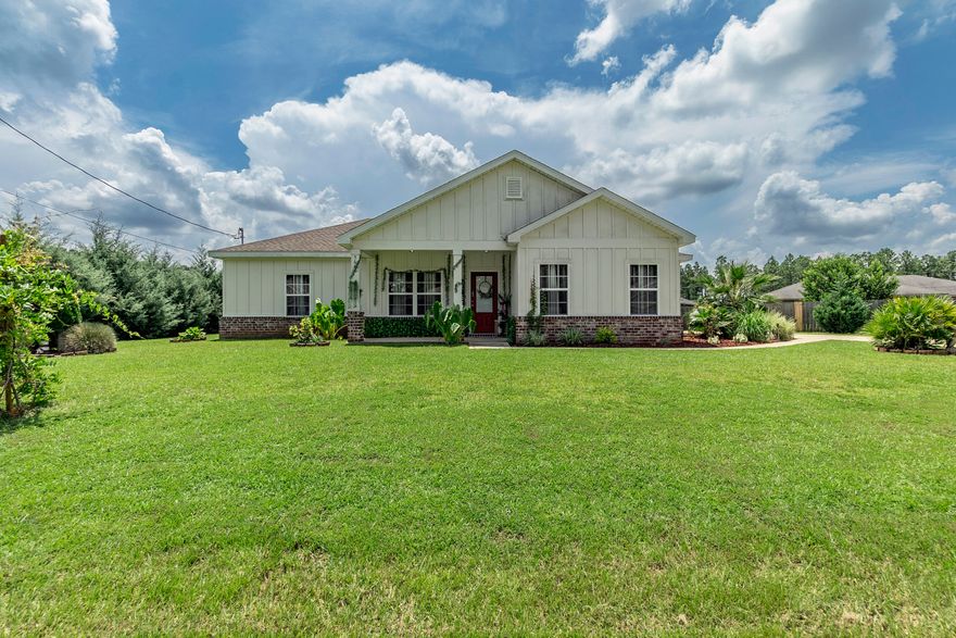 Discover the perfect blend of classic charm and contemporary convenience in this beautifully maintained Craftsman-style home. Built in 2020, this 3-bedroom, 2-bathroom gem boasts exquisite brick trim and stylish board-and-batten siding, setting a welcoming tone right from the curb.Step inside to find soaring 9' ceilings and an open-concept living, dining, and kitchen area, ideal for entertaining and family gatherings. The heart of the home features a sleek kitchen with a large work island, granite countertops, and a spacious pantry--perfect for any home chef.