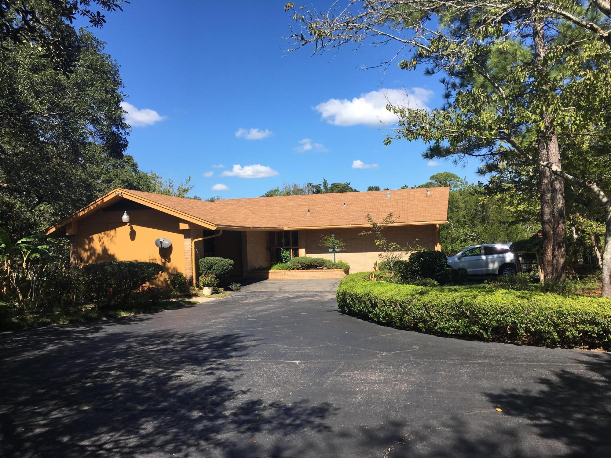 Professional pictures coming soon...This is an absolutely beautiful oasis situated on almost 3 acres in the heart of Fort Walton Beach. Its' grounds have been lovingly cared for and it shows as soon as you enter the gate. If serenity with a convenient location is what you are looking for - this is the property for you!