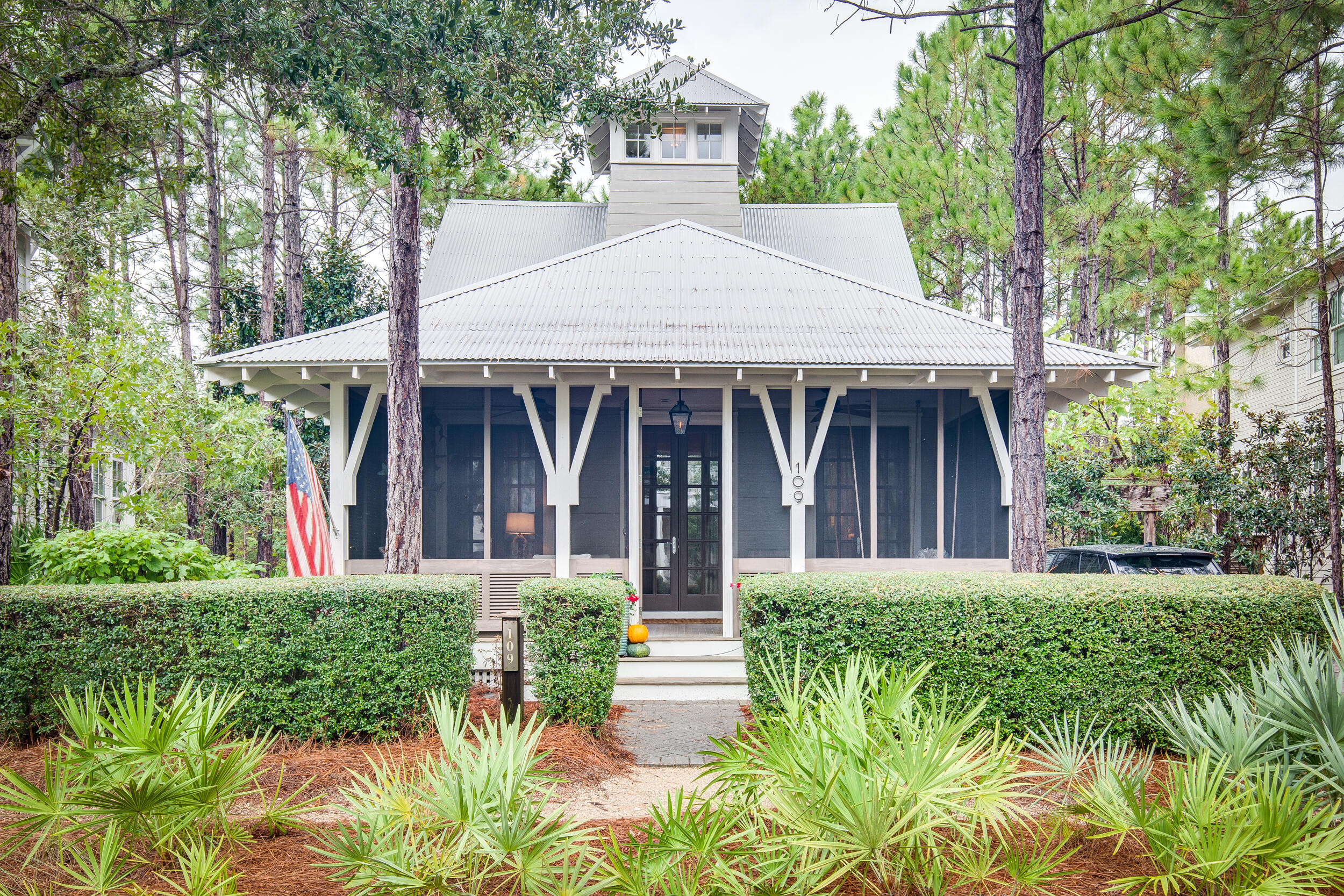 Charming beach cottage in the much sought after Sandy Creek section of Watercolor. Interior Designer Cindy McCord from Memphis added her signature touches to this wonderful home. This home sits on a large lot with plenty of room to add a pool or carriage house. The master bedroom, living, dining and kitchen are all located on the first floor which makes this an extremely functional primary or secondary home. Some of the coveted features on the first floor include a cozy screened-in front porch, stunning quartz kitchen island and multiple areas for storage. The master bedroom has walk in closets, a quaint sitting area and a spacious master bath with separate walk in shower. Upstairs you will find two more bedrooms and each has its own private bath with shower and tub.