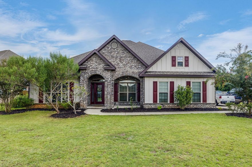 1 of the largest lots in Redstone Commons and over 3000 sqft! This previous model home has all of the upgrades and is ready for you to move right in! Wood-grain tile flooring in the entry and wet areas and BRAND NEW CARPET in the main living area and bedrooms! Granite countertops with white shaker cabinets, tray ceilings, crown molding, THREE CAR GARAGE, 6'' baseboards, recessed lighting, split bedrooms for added privacy, and the master suite is PERFECT! Double vanity, custom tile shower and soaker tub, and a 11x7.5 walk-in closet! Enjoy your mornings on the covered front porch and your evenings on the back porch overlooking this HUGE back yard! Less than half a mile to local elementary and middle schools and a short drive to base- this is one you don't want to miss!