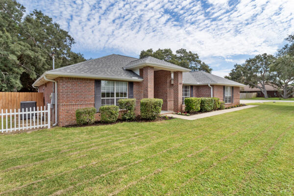 Assumable Mortgage - No VA Eligibility Required! Rare opportunity to assume a very favorable rate on this meticulously maintained home just minutes from the Gulf's white sand and emerald waters. Nestled on a large treed corner lot, this property offers peace, privacy, and modern updates throughout. Features include an in-ground pool with screened enclosure, double gates on both sides, and a large shed with A/C and electric added in 2024. Major upgrades: new roof (2020), HVAC (2021), hot water tank (2023), stove & microwave (2022), pool pump (2023), septic pumped (2025). Inside, you'll find inviting living spaces with stylish updates perfect for relaxing or entertaining. The community offers resort-style amenities--tennis, pickleball, basketball, indoor/outdoor pools, gym, campground, ball fields and more. Relax in style and enjoy the Emerald Coast lifestyle all with the benefit of an assumable mortgage at an excellent rate! Call me to check the rate and let's make this home yours.