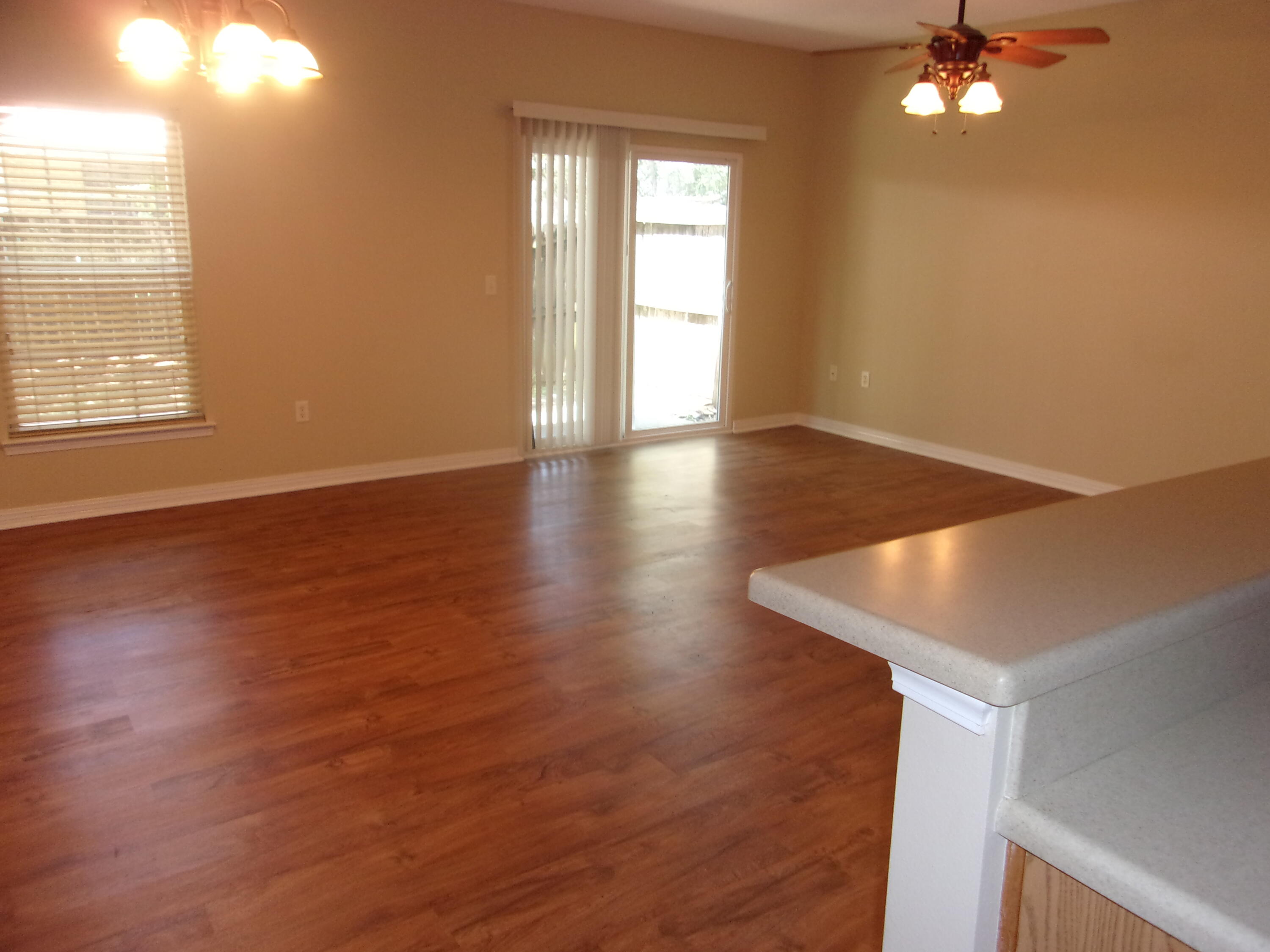 Well maintained 3 bedroom 2.5 bath townhome in central Niceville. 1st floor boasts wood floors in the large open great room with the living and dining areas. The kitchen is tiled and has tons of cabinets and pantry storage. 2nd floor is carpeted. Roomy master bedroom and bathroom. Two other bedrooms and a full bathroom are across the hall . Privacy fenced backyard. Located close the schools, bases and shopping.