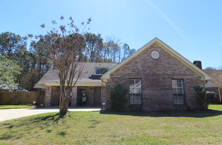 FIRST CLASS HOME SITUATED IN THE DESIRABLE OVERBROOK NEIGHBORHOOD! Step into the foyer to find high vaulted ceilings and an open staircase leading to the loft area. Spacious living area with tile flooring throughout, built-in book shelves, center fireplace with river rock stone front and white mantle and windows on each side with custom plantation shutters. Formal dining area opens into the living area making entertaining a breeze. Kitchen has lots of granite counter space, corner deep sink with designer faucet, center island for additional storage, stainless appliances, large pantry and custom tile flooring throughout. Nice breakfast area with windows overlooking the enclosed Florida room. Relax and enjoy your private backyard from inside your all weather Florida room. Master