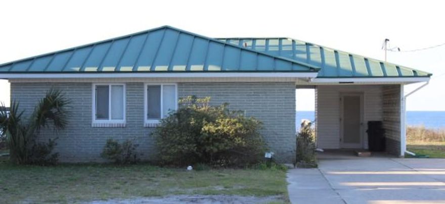 Location! Location! This charming one level cottage in Old Seagrove is just a short walk from Seaside and Watercolor. It sits atop a protective bluff with private walkover and features 3 bedrooms, 2 baths, an enclosed Florida room, a storage building and large deck for enjoying sizzling sunsets.The site measures 60' x 174' with plenty of room to build a large multi-story home. There are two popular nearby restaurants just minutes away.An owner can enjoy a stream of rental income with $67,645 already on the books as of February 20th.