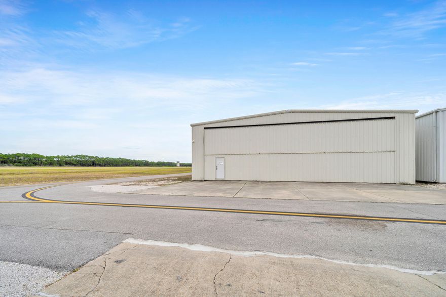 The Destin Executive Airport (DTS), located in the heart of Destin, Florida, rarely offers private leaseholder interest in hangar opportunities. We are now offering one of the most price-effective airplane hangars at DTS.  The related ground lease matures in approximately (9)-years, on May 31, 2033. The conditioned metal building contains manual swing doors and is oriented at a prime end-cap location, adjacent to the taxiway, and convenient to the FBO to utilize the host of supporting aviation services. Please inquire for further details and to schedule a private showing. Hangar Depth: 45' Height in Center of Hangar: 15' Swing-Door Opening Width: 50'