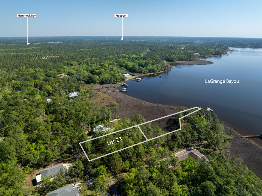 This acre includes 2 parcels, 29-1S-19-23010-00B-0230 and 29-1S-19-23000-005-0052. The lot size of 110x339 does not include the narrow strip of land leading to the water.