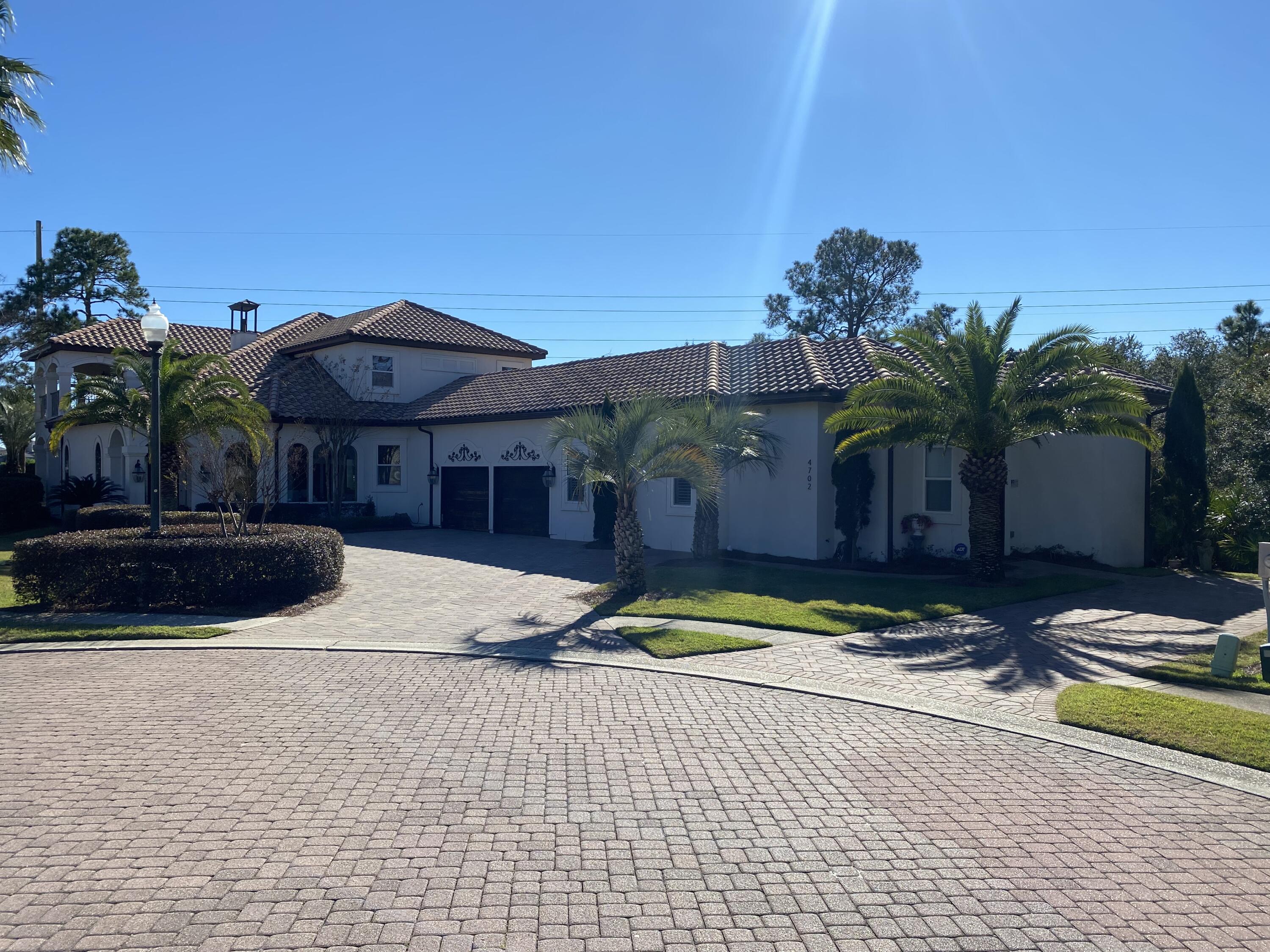 This beautiful home is perfect for Rental, 2nd home or primary residence. This magnificent 6 bedroom room sits on one of the largest lots in Destiny East. Nestled at the end of the cup-de-sac gives plenty of privacy.  Huge back yard with plenty of room for a pool. Approximately 120'' of lake frontage. . Easy access to paddle board or fish right from your back yard. Great open floor plan with enormous Master Suite on first floor with sitting area and access to covered porch. Stainless steel appliances, gas stove, walk in pantry, wet bar and additional living/game room on second floor. Crown molding, hardwood and tile throughout. Attached mother n law suite with full kitchen,1 1/2 bathrooms, living room and 1 bedroom. Gated community, clubhouse offers pool, tennis courts, playground,
