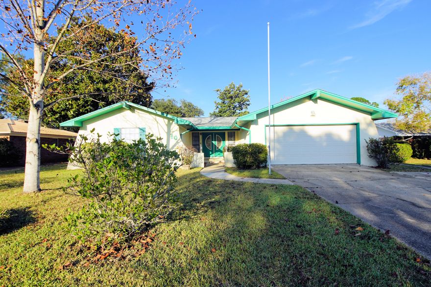 Come home to the Lake Lorraine area in Shalimar, FL with this wonderfully ,well-maintained family home! Enter the home through the custom double entry doors that open into a tiled foyer, a spacious open family room and dining area off to the left. The large florida room (not included in sq ft) is straight ahead over looking the lovely backyard with saltillo tile flooring. The kitchen with an open pass-thru bar into the family room has tile flooring and plenty of room for a eat-in table area as well. The doors in the kitchen open up to a covered patio for those nights when you want that outdoor dining experience. The Master Suite with 3 large closets and updated bath is located near the kitchen while 2 large bedrooms and privately located guest bath are on the opposite side of the house