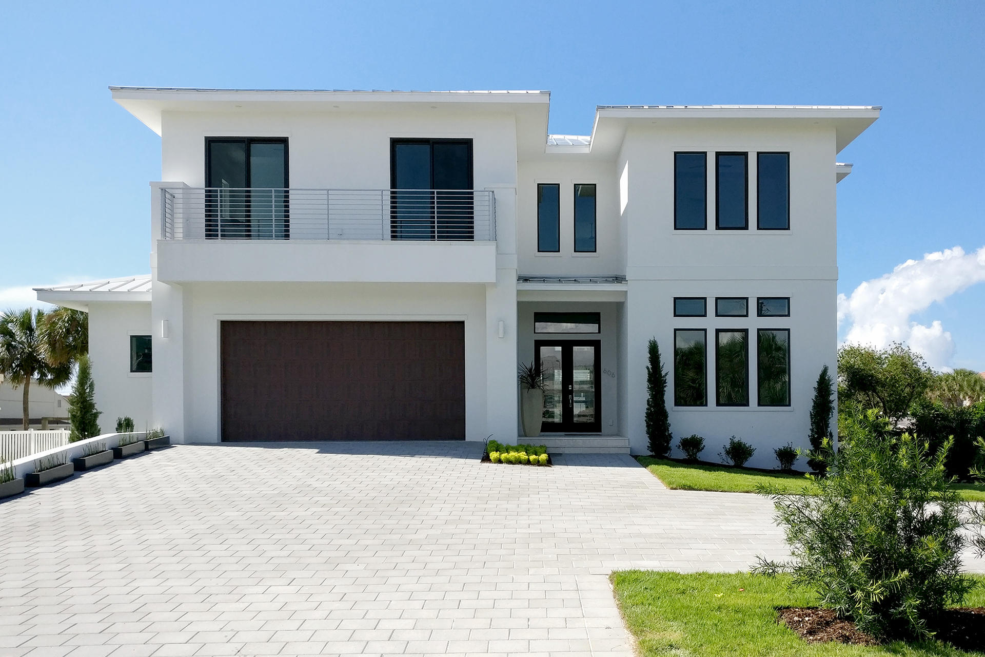 Gorgeous 5BR/5.5BA 5,086 SF 2 Story Energy Efficient Home right on the Canal on Holiday Isle with Room for a 90FT Boat. Enjoy Beautiful Sunrises and Sunsets on the Water only a 5 Minute Boat-Ride to Destin Harbor! Amazing Contemporary Design and a Pool to Die For!!! This Wonderful Home Features, Fireplace,Rinnai,Quartz Countertops,Polished Concrete Floors Downstairs and Hardwood Upstairs. The Chefs Kitchen Includes Sub Zero Appliances, Wolf Double Ovens & Wolf Gas Stove, Wine Cooler, Hidden Pantry and Cocktail Ice Maker. The Entire Home Uses LED and is Completely Wired for Alarm/Surveillance, Audio & Video Systems! There is Full Surround Sound Throughout the Home. 2 Five Ton A/C Units, and Spray Foam Insulation Keep things Cool and Energy Efficient. Come Check Out this Amazing Home
