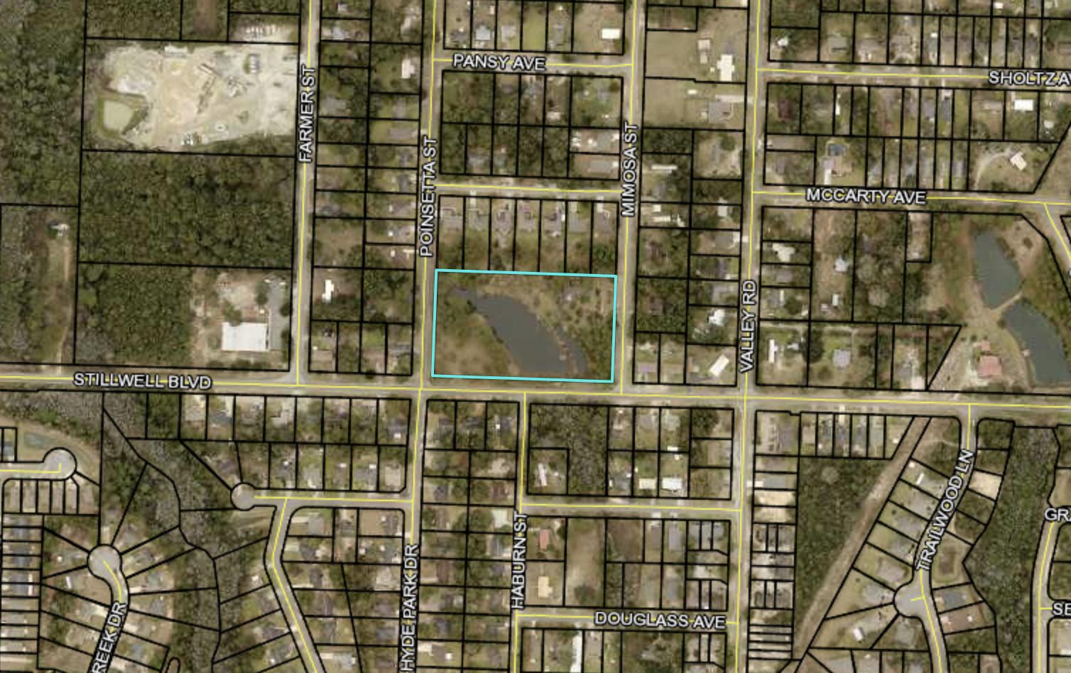 3.75 Acres with pond! The perfect piece of land. Very central. Easy to own or may be divisible with county approval. (Check with county). Close to shopping and schools.