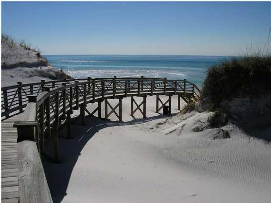 Large corner lot located in the gated community of WaterSound Beach.Enjoy the all the amenities of Watersound Beach which include community parks, nearly one mile of pristine beach, pools, fitness center, seven miles of boardwalks, woodland and conservation areas and 24 hour security.