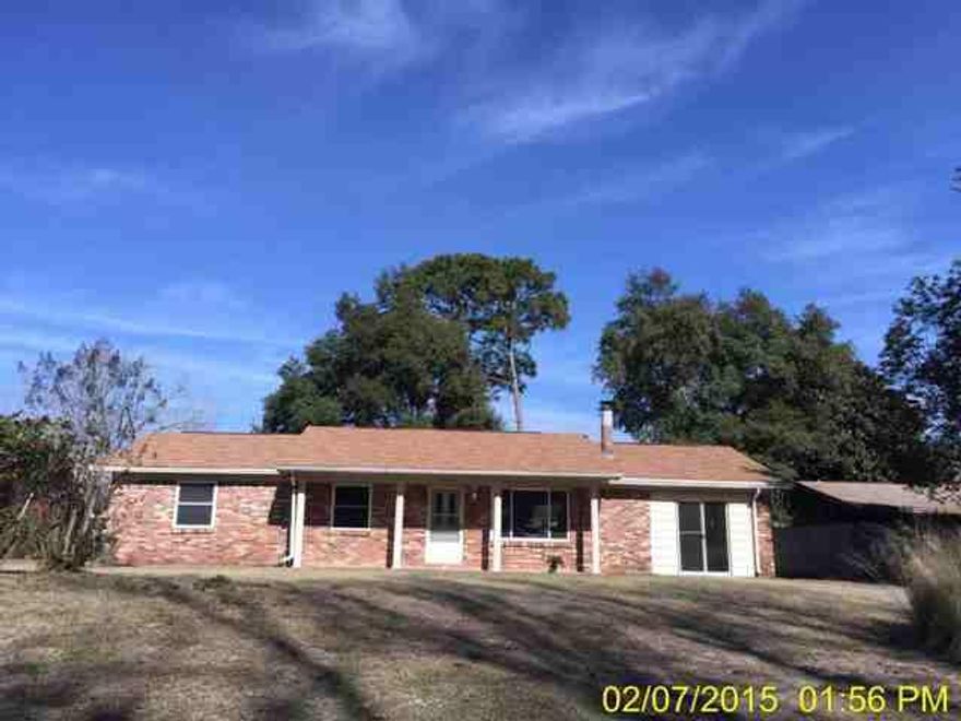 Lots of Potential in this All Brick Ranch centrally located in Niceville... 3 Bd / 2 Ba home with fireplace in living room, spacious kitchen, covereted garage for study, den or play room. Fenced back yard with storage shed. Situated in Palm Estates, the home is close to Eglin AFB, schools, shopping & dining. Prior to seller receipt & approval of the full title package from foreclosure, title to the Property will be conveyed by a quit claim deed. Property was built prior to 1978 and lead based paint potentially exists.