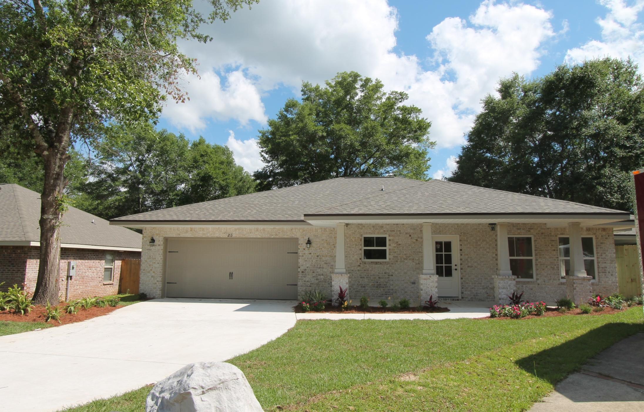 Brand new construction!! Awesome floor plan by multiple award winning builder and 2017 Parade of Homes winner! This 3/2 custom brick home has super curb appeal. There are 10 ft. ceilings w/ impressive crown molding, 5 1/4'' baseboard and plank tile flooring, throughout the main living areas, and wet areas. As you approach the front of the home, you will be quite impressed. The covered porch is very welcoming, and the 8 ft., incredible leaded glass door, makes for a grand entrance. The formal dining room is at the left of the home's front. You will then enter the chef's delight kitchen will which boasts maple cabinetry, granite countertops, a huge pantry, a storage closet, and stainless appliances (including an oversized commercial grade frig./freezer). At the right of the home's entrance is bedroom one, continuing down the hallway is the guest bath, then bedroom two. The oversized greatroom is in the rear of the home and opens to a covered porch, which is perfect for entertaining. The master suite is oversized, has 2 large walk - in closets, a walk - in shower, a whirlpool garden tub, and a double vanity. The laundry room is at the rear of the kitchen, and has a door which opens to the garage. The yard is beautifully landscaped and comes complete w/ a sprinkler system and timer, and will be fenced. Insurance will be very reasonable, as home is built to today's code and plywood window coverings are being provided for storm protection.. Completion expected in late August..