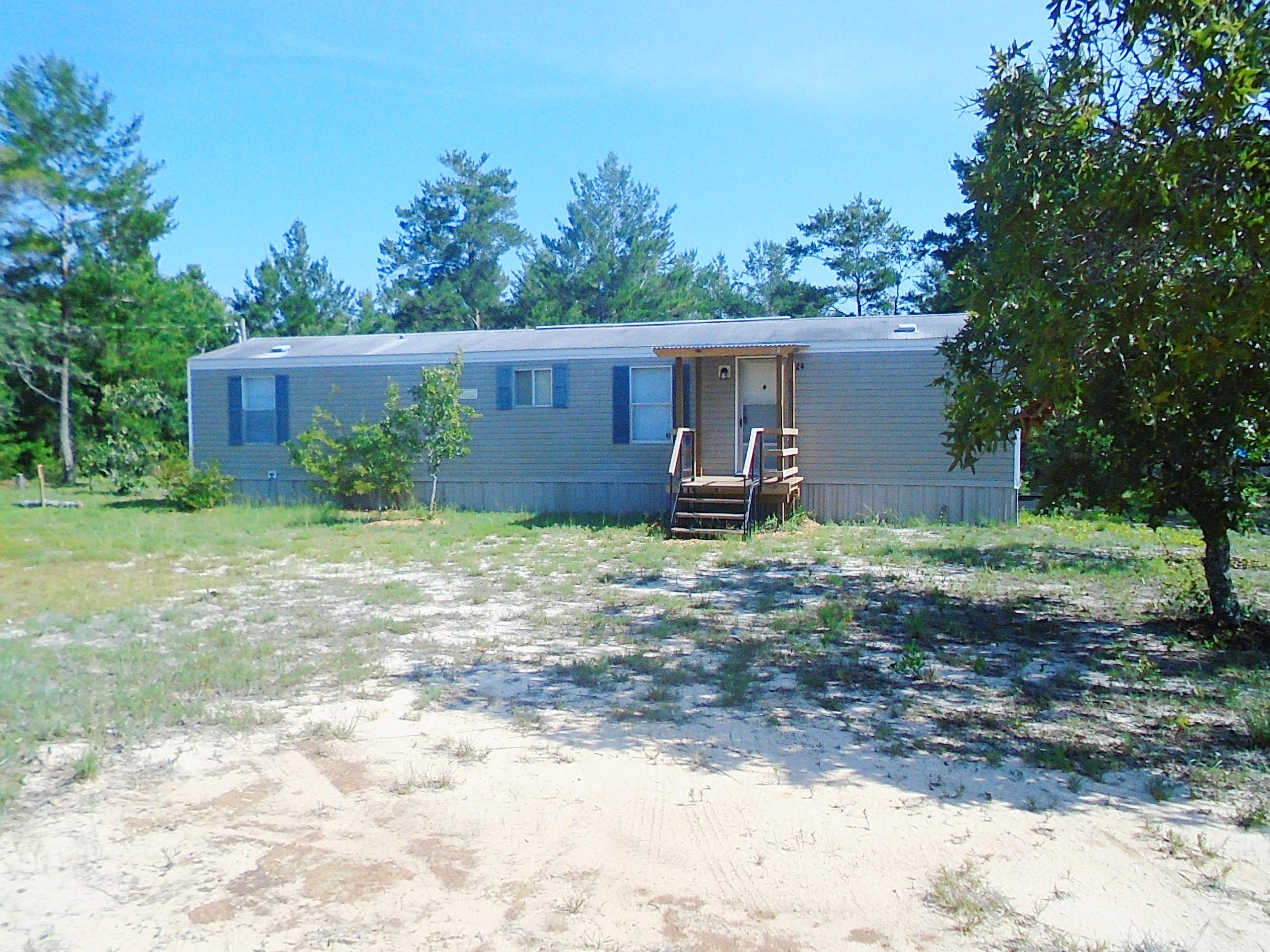 THIS 2 BEDROOM 1 BATH HOME IS LIKE NEW! HOME SITS ON A LARGE CORNER LOT LOCATED JUST WEST OF DEFUNIAK AND IS CENTRALLY LOCATED TO NICEVILLE, EGLIN AFB, AND CRESTVIEW. HOME IS MOVE IN READY AND INLCUDES ALL FURNISHINGS AND APPLIANCES. HOME HAS A SPLIT FLOOR PLAN, LARGE OPEN KITCHEN -DINING - LIVING COMBO. NEAT AND CLEAN HOUSE AND YARD.