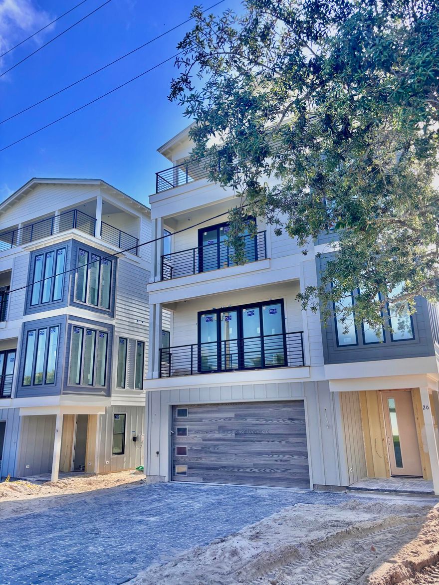Gorgeous four-story rental dream under construction, south of 30A on Mary Street in Blue Mountain Beach. Take advantage of preconstruction pricing and add your personal touch to finishes. (May 2025 completion date) Perfect for indoor/outdoor entertaining, the first level includes a half bath and mini kitchen with a full sliding wall that opens to the pool deck. The second floor features the spacious kitchen, dining and living area, perfect for large families or parties to gather. The kitchen features Thermador appliances, a gas stove, ample counter space for serving, and a walk-in pantry. The third floor boasts a lovely master suite with a private balcony. Two guest suites with private bathrooms are also available on the third floor, one of which would be ideal for a multi-bunk room.