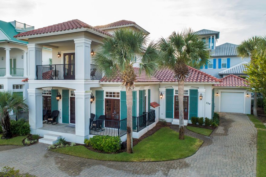 Welcome to this stunning Mediterranean villa in the coveted Caribe community of Miramar Beach, FL. With 4 bedrooms and 4.5 bathrooms, this home offers a spacious open concept layout and breathtaking lake views. Inside, you'll find a bright living room, kitchen, and dining area with 10' ceilings. The first-floor guest suite has a private entrance and sitting area, while the master suite provides easy access to the patio. The main kitchen features a wraparound breakfast bar and beautiful hardwood cabinetry. Upstairs, there are two guest rooms and an additional living area. The third floor offers a sitting area, office space, wet bar, and two balconies with views of the lake and Gulf. Caribe is a gated community with pools, tennis courts, and private beach access.