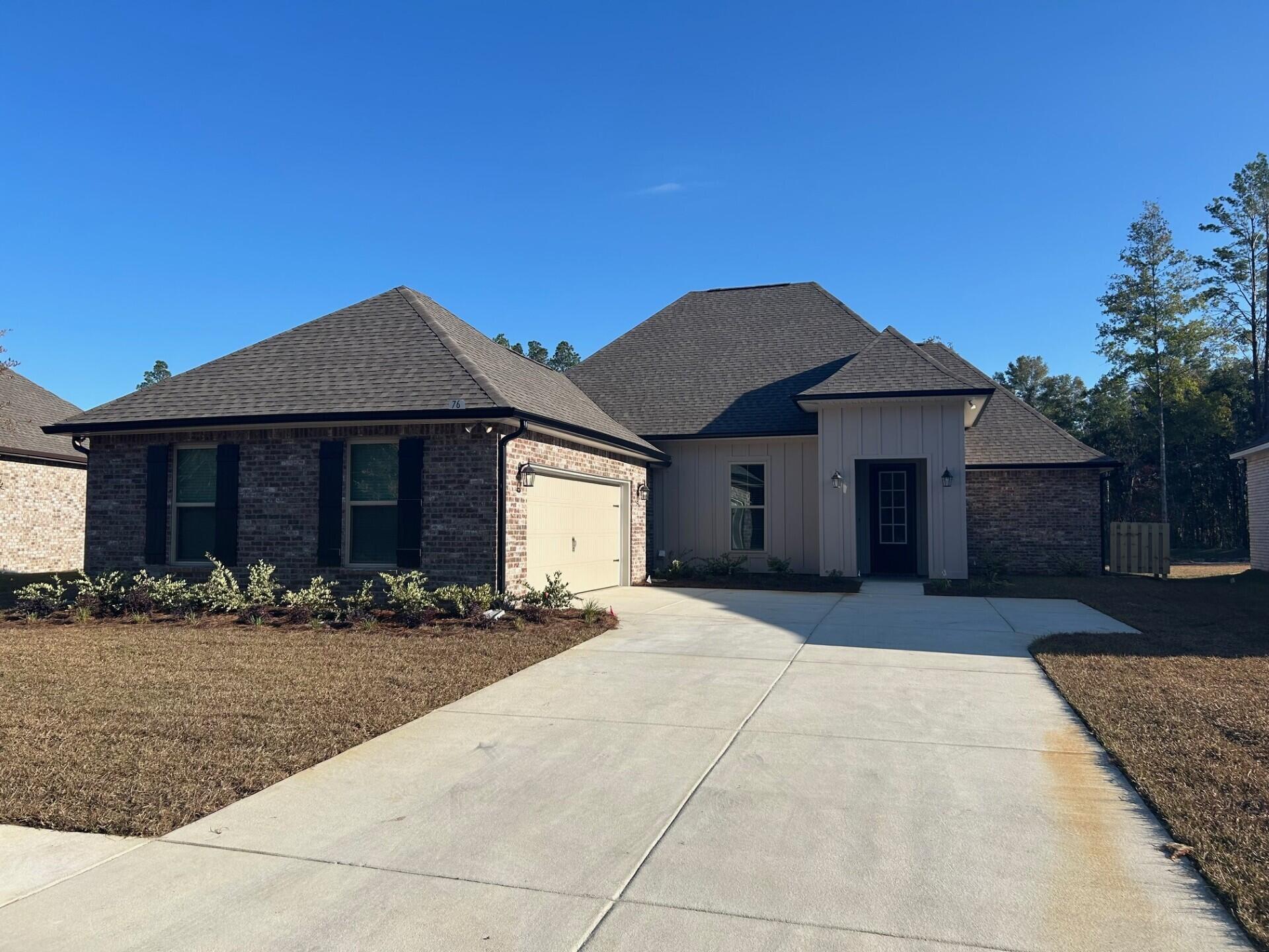 The CLAUDET III G in Bird Song at Hammock Bay community offers a 4 bedroom, 3 full bathroom, open and split design with formal dining room and keeping room. Upgrades added (list attached).  Features: double vanity, garden tub, separate custom tiled shower, and 2 walk-in closets in master bath, tray ceiling in master bed, en suite bath in bed 2, kitchen island, walk-in pantry, boot bench and drop zone in mudroom, covered front porch and rear patio, crown molding, recessed lighting, smart connect WIFI thermostat, smoke/carbon monoxide detectors, landscaping package, architectural 30-year shingles, flood lights, and more!Energy Efficient Features: water heater, kitchen appliance package, vinyl low E windows, and more! Energy Star Partner.