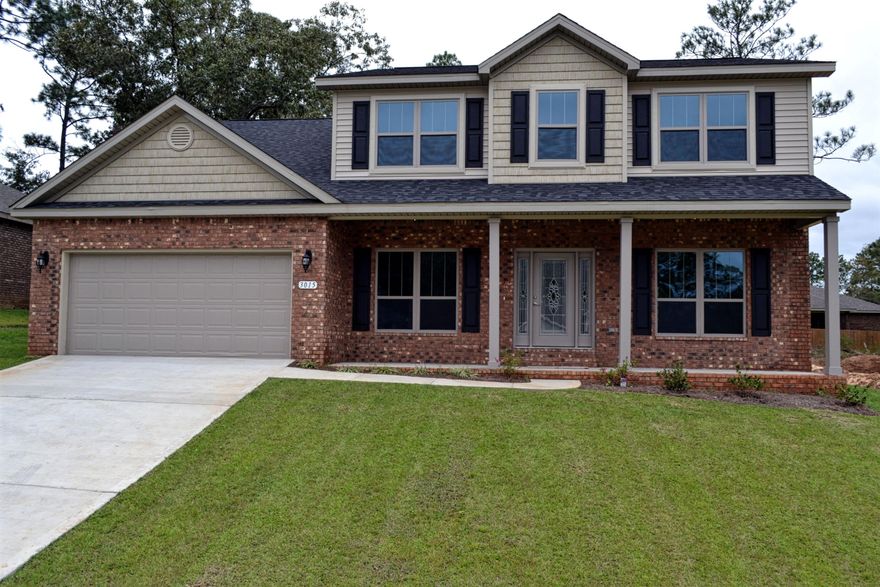 Whitworth Builders Cape Hope two story design. Designed with family living/entertaining and function in mind. Downstairs has a living room, dining room, office and a great room as well as a kitchen that is out of this world!! Stainless steel range, microwave and dishwasher along with a MASSIVE granite center island that also has an overhang for a seating area. The breakfast nook is separated from the cozy great room by an arched half wall. There is a large covered porch off the great room perfect for relaxing or outdoor entertaining. There is a ''drop zone'' with cabinets, drawers and a granite countertop as you enter the home from the garage for you to set your purse, keys, cell phone, or laptop