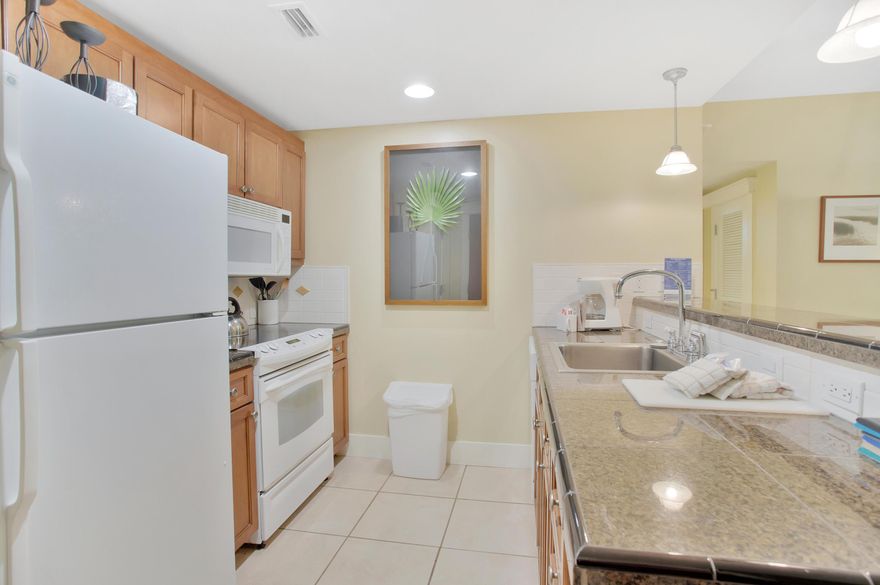 This ground floor, 2-bedroom condo not only allows easy access to the Grand Sandestin Pool and the Village of Baytowne Wharf but provides multiple rental capabilities (2 bedroom, 1 bedroom, and studio). All the living areas have wood-look flooring for easy cleaning after a day at the beach. The open living room flows into the dining area and kitchen for plenty of room to entertain. The master bedroom features a king sized bed and flat screen tv. The studio unit includes two queen sized beds, a kitchenette with a microwave and mini-fridge, and a private bathroom. Both units have a private patio. Guest and owners will be able to take advantage of a fitness center, and resort style pool. Owners enjoy access to the exclusive Solstice Club, an amenity featuring grills, screened porch & more.