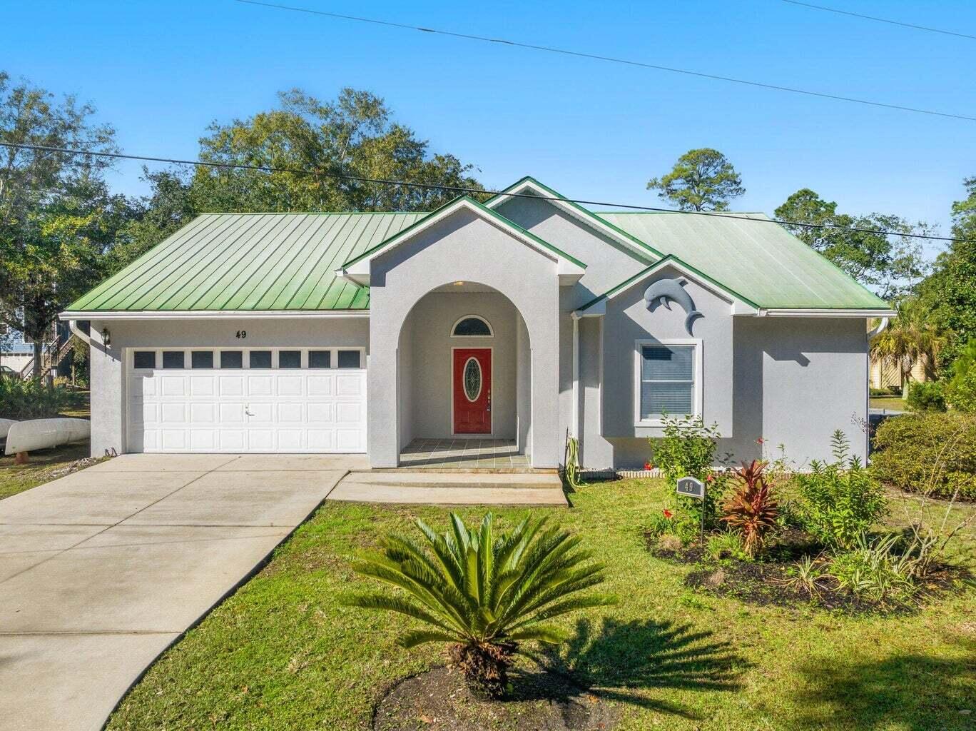 LOCATION LOCATION PRIVATE BAYOU ACCESS LOCATION. Wish Lane is nestled in one of Santa Rosa Beach's Bayou neighborhoods, Osprey Cove. Located on a cul-de-sac and just steps from your private boat slip with lift and padding access.  Live Oak trees canopy the private roads of this quiet, well-established community. House has metal roof and is built from Hebel Block.  Built in 1996, this home has been completely renovated through-out.  Bayou living at its best in this 3 bedroom/2 bath ranch including a 21x10' screened in porch with outdoor patio, 10' ceilings, and 2 car garage. This large lot boasts ample room to store an RV, Boat, and Jet-skis**This home is available for short term rentals. ** Drive time to popular destinations: