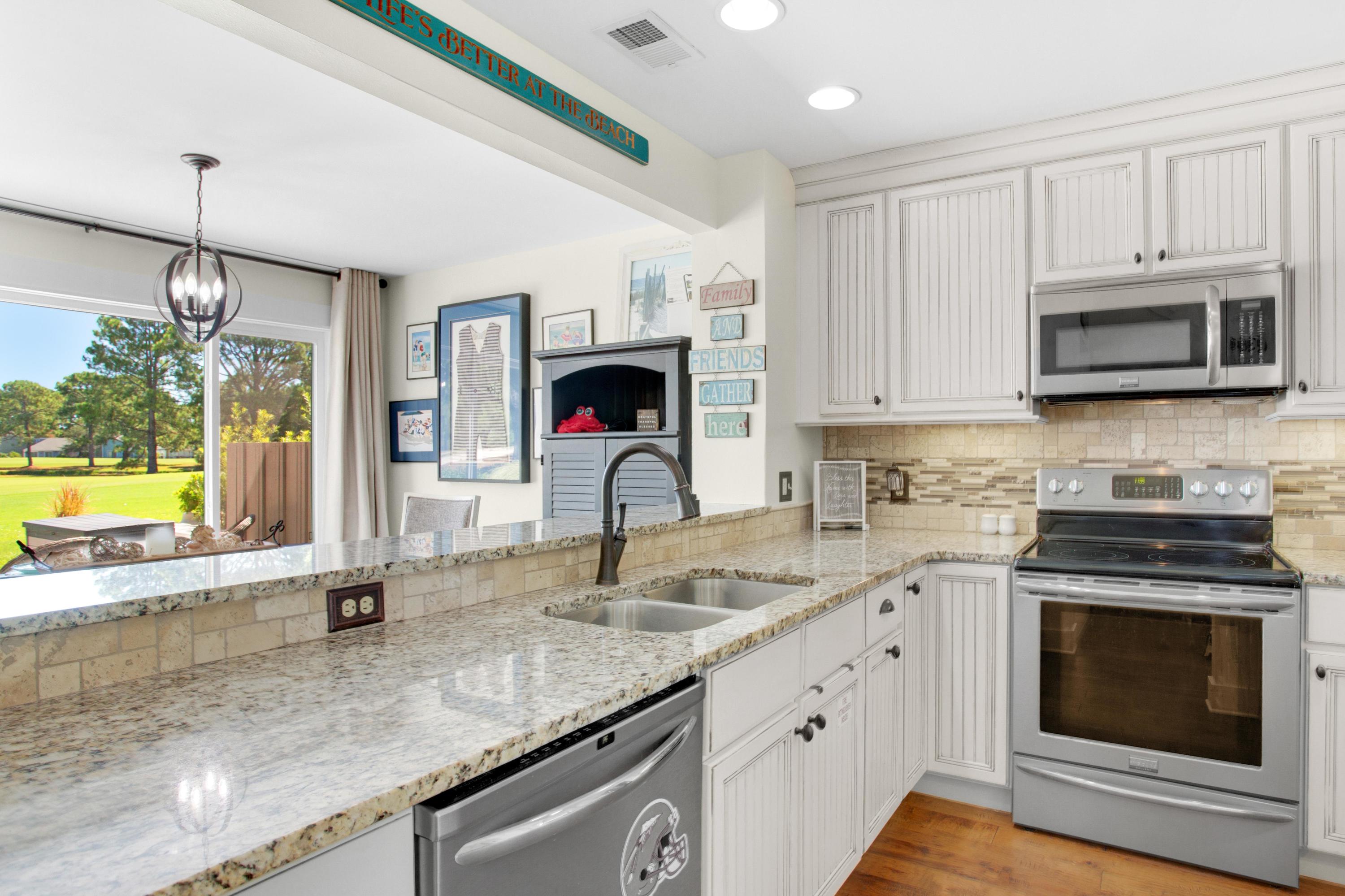 Enjoy golf course and lake views, as well as bay views on the horizon, from the patio of this 2-story townhome situated in the Fairways at Sandestin. Numerous windows throughout allow ample natural light into the home. With the main living area downstairs, there is plenty of room to entertain in the open concept living and dining area. The kitchen features stainless steel appliances, plenty of counter-space, and enough cabinets to store all of your kitchen necessities. On the second level you will find 2 bedrooms, each with their own private bath. The Master Suite features views of the Choctawhatchee Bay, a laundry closet in the bathroom along with a linen closet. Enjoy the outdoor patio where you can take in expansive views of the 6th fairway of Links Golf Course, Lake, & Bay. Fairways