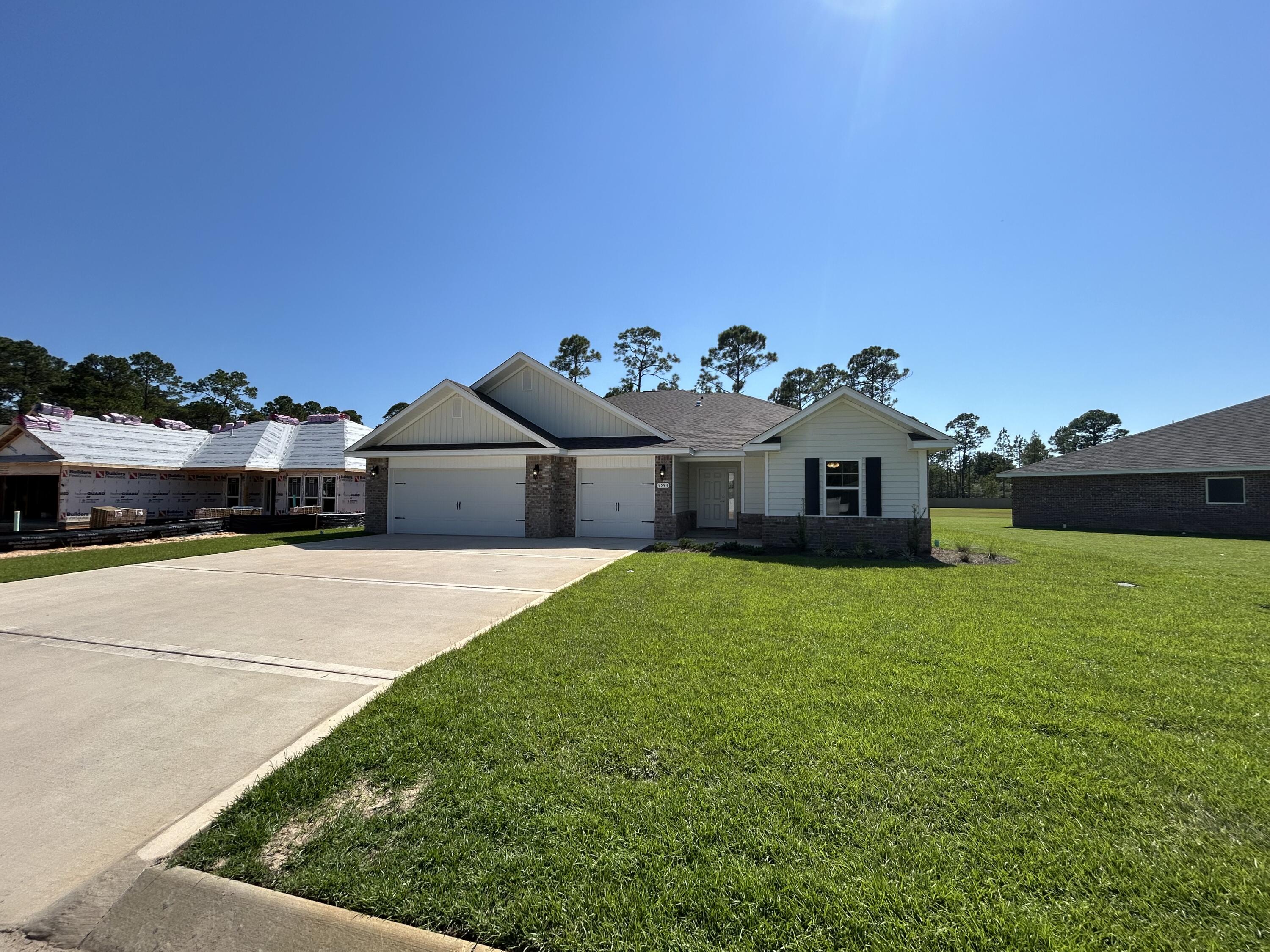 *New Construction in Creets Landing Subdivision * This Plan Features: 2 x 6 Exterior Construction, 4BR/3BA *3 CAR GARAGE * 10 Ft Ceilings & Laminate Wood Plank Flooring in Main Living Areas * Granite Countertops Kitchen & Baths * Tile Flooring in all Baths* Ceiling Fans in all Bedrooms & Family Rm * Main Suite with Trey Ceiling & Main Bath with Builder's Signature Zero Entry All Tile Walk in Shower with 2 Shower Heads, Separate Garden Tub, Double Vanities & Walk-in Closet * Kitchen Features: Granite Countertops, Large Island, White Shaker Style Soft Close Cabinetry, Stainless Steel Appliances & Walk in Pantry * Breakfast Cafe * Covered Front Entry and Rear Lanai with Ceiling Fan *Lawn Pump, Well & Irrigation System for Sodded Areas * Builder Warranty Included *