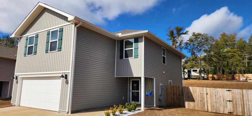 Welcome to Harrisburg Estates. The 2 story Aisle floorplan, is a  desirable & relaxed open concept, great for entertaining. The well-designed kitchen offers stainless appliances, Granite counter tops, undermount sink, with a beautiful new faucet,  built in microwave, quiet dishwasher, pantry, smooth-top range & large island bar. The second-floor hosts spacious Master suite with adjoining beautiful bath, featuring Granite double vanity, undermount sinks, extra storage & lg. shower. Three more bedrooms and shared full bath. Striking wood-look flooring & plush carpet in the bedrooms. Smart Home Connect System also included with ADT service if the new owner desires to keep in service. Home located just off the road that leads into the new bypass being completed. 30 minutes or so to our beautiful sugar sand beaches on the Emerald Coast. Make you appointment today to come and view the wonderful opportunities.