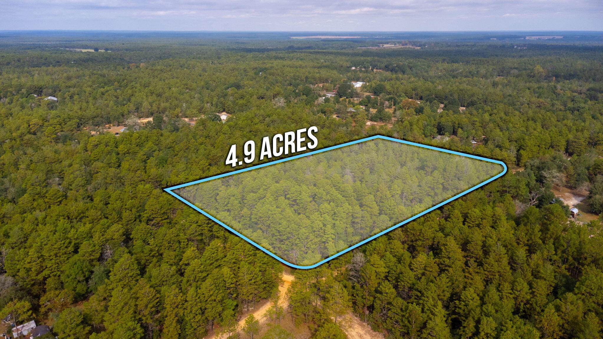 This flat 4.9 acres is in a great location central to Crestview and DeFuniak Springs. You will find it in a quiet rural neighborhood. It does have access to public water through Mossy Head Water Works although there is no utilities hooked up to the property currently. It is high and dry with no signs of being in a flood zone, according to the county flood map. It is a corner lot being bordered by White Rd., Ranger Rd., and Brown Mason Rd. The zoning allows for all home types.