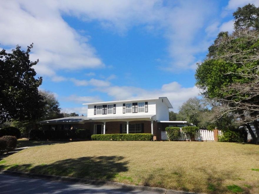 This stately home is available and ready for a new family and is close to bases, schools and shopping. You'll appreciate where this home is located. on a corner lot in a comfortable neighborhood, and next to a cul de sac. There is even a park nearby.This 4 bedroom home has a two car garage and lots of living space for the family. There is a living room, formal dining room, breakfast room and family room.plenty of room for everyone. Outside, you can enjoy the Florida lifestyle with a beautiful in ground pool, and large brick patio. The large patio wraps around the corner of the house and offers a private garden view outside of the living room sliding doors.