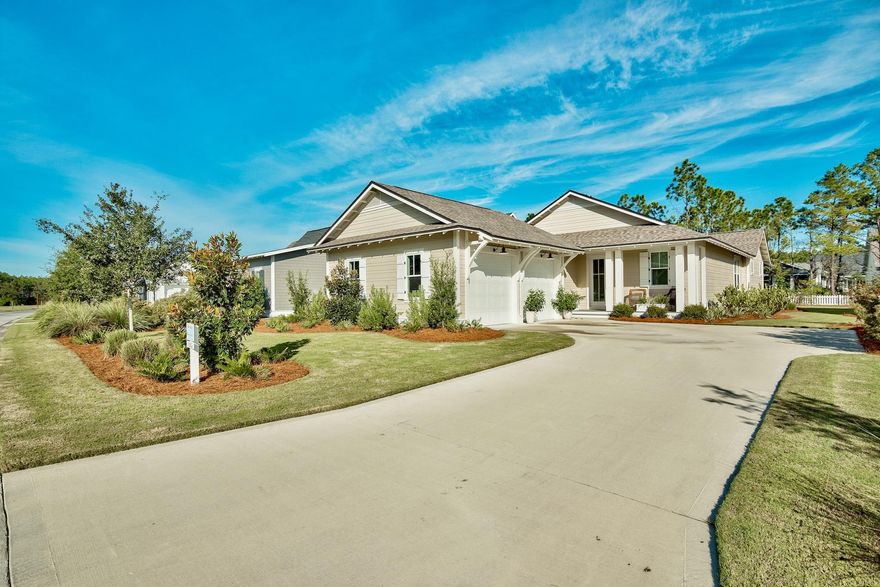 Why buy New when you can have better than new! This Popular Bellis Floor plan is move in ready! Situated on a premium lot with water view, this home has $30,000 of upgrades to include Quartz Counters, Main living area hardwoods, french doors onto large screen porch overlooking private back yard. Closets with wood shelving, additional landscaping & Irrigation. Master bath with separate vanity, beautiful dry bar, spacious secondary bedrooms, large master suite and very open large family room, dining room and kitchen. Custom changes to include laundry access and built in cabinets in the side entry garage. Do not miss this opportunity!