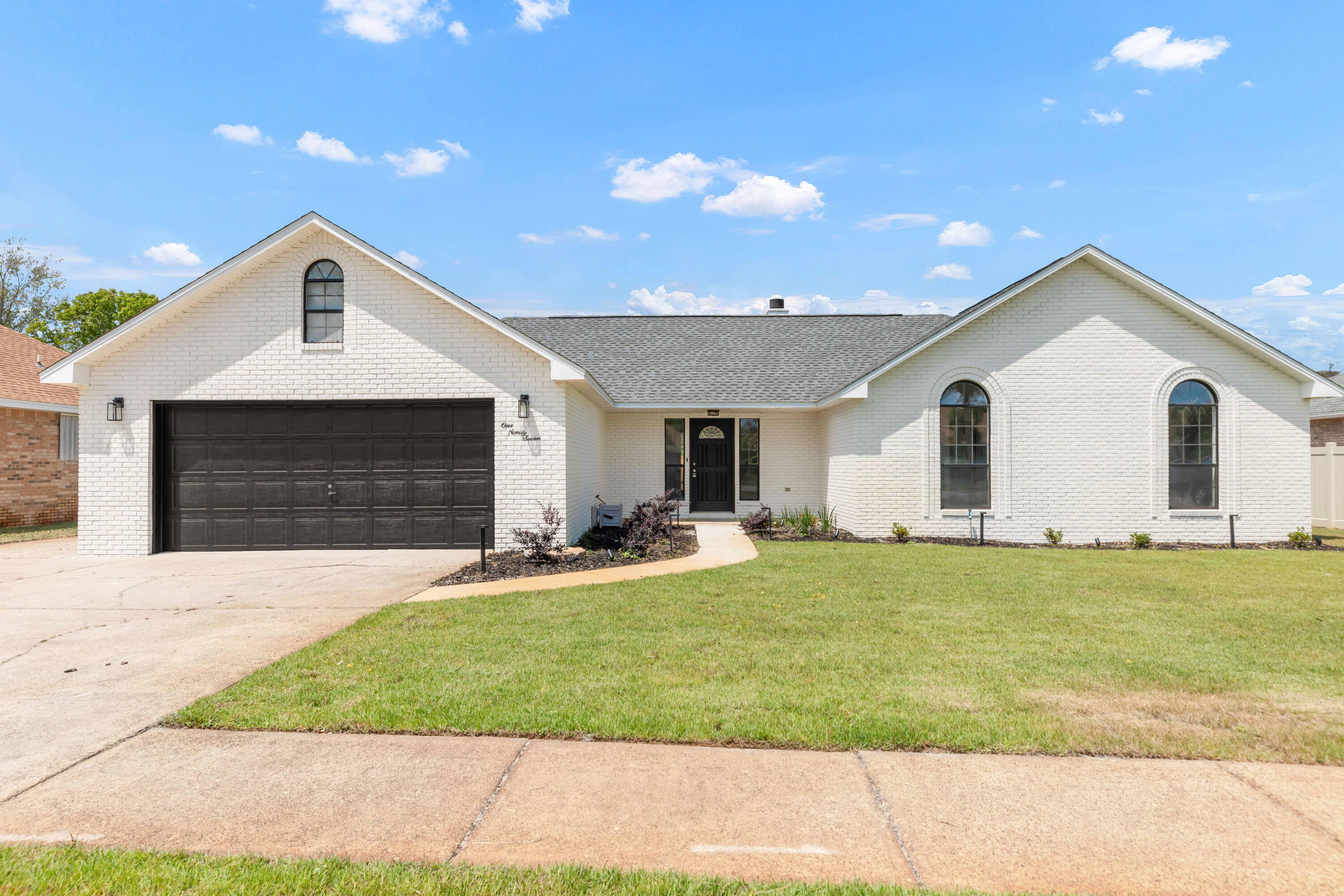 PRICE REDUCED $10,000! Discover this totally remodeled gem in the highly desired community of Emerald Breeze Estates! This 3-bedroom, 2-bath home is just 2.5 blocks from the sugar sand beaches, Destin Commons, top-rated restaurants, and premier golf courses, the location is unbeatable! Step inside to soaring cathedral ceilings and a bright formal living area featuring an electric fireplace. The new and spacious kitchen offers a breakfast bar and opens to a formal dining area, ideal for gatherings and entertaining. The large master suite boasts a walk-in closet, his/her vanities and a walk-in shower. Two additional bedrooms provide ample storage and comfort for family/guests. Enjoy the privacy of a fenced backyard with a screened-in patio and an extra outdoor patio space.